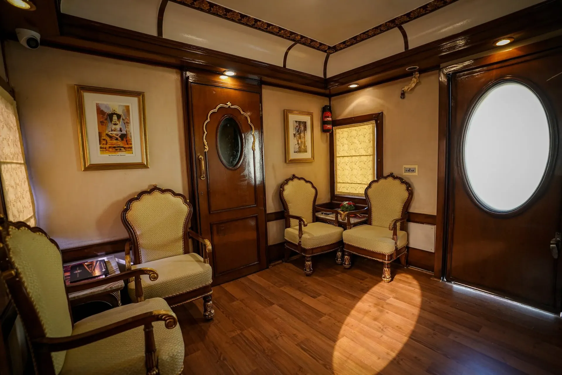 Golden Chariot private sitting area with carved wood interiors